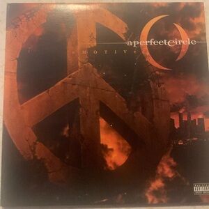 orange vinyl first pressing  albumn emotive by the band A Perfect Circle.